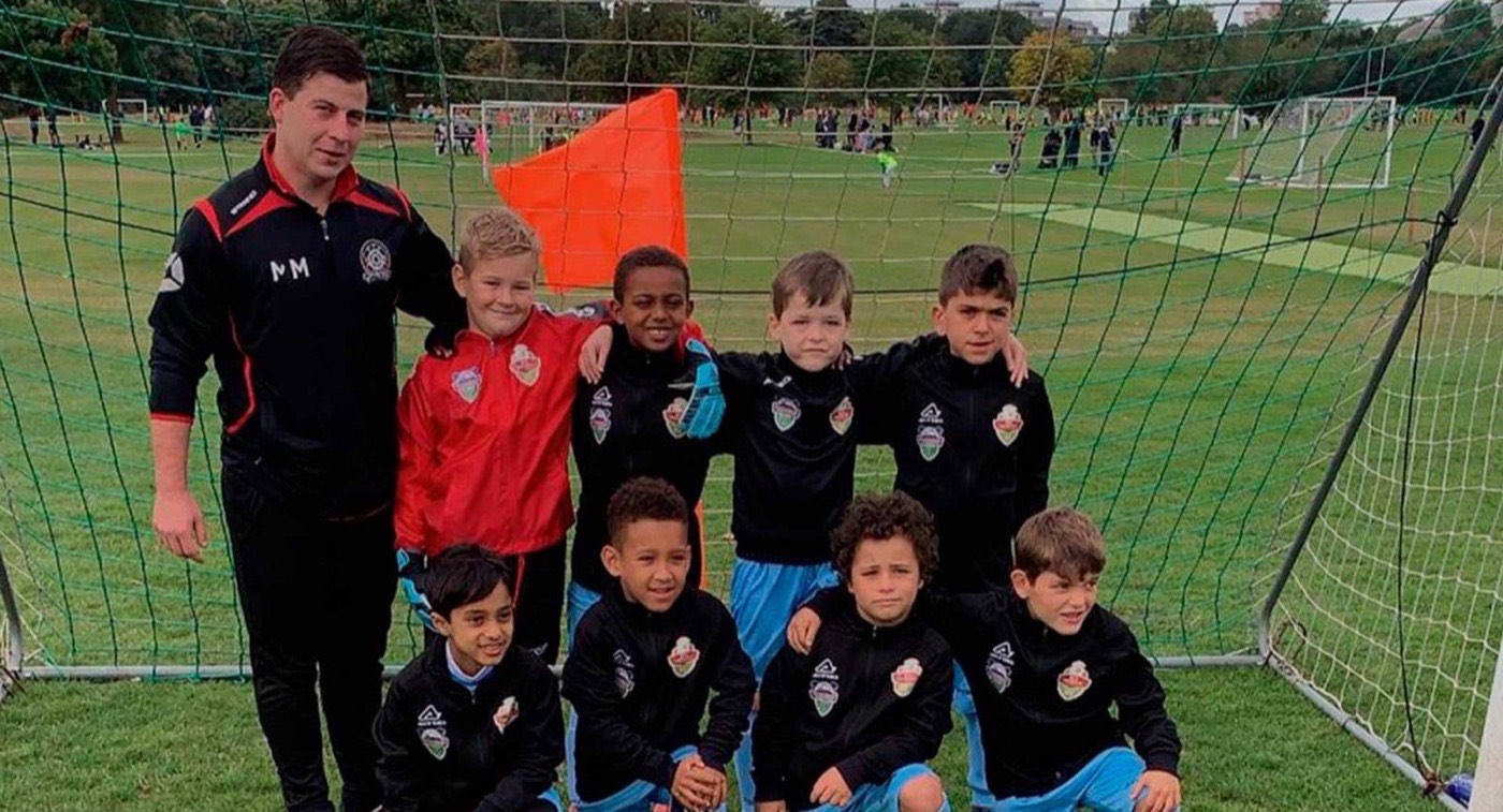 PFA United academy squad with their coach