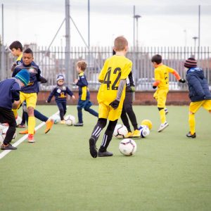 boys practising football